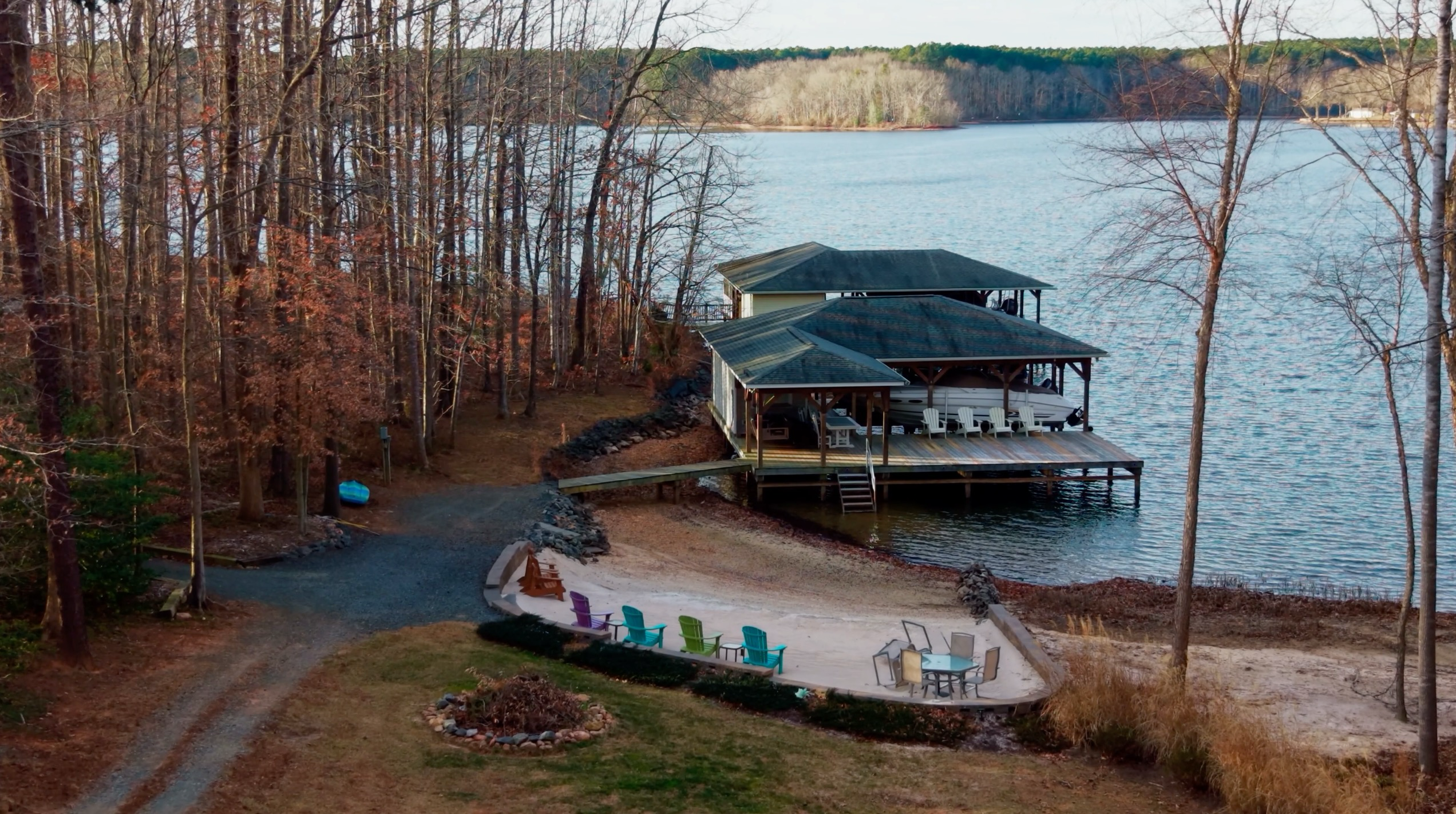 Lakeside property and dock photographed from above